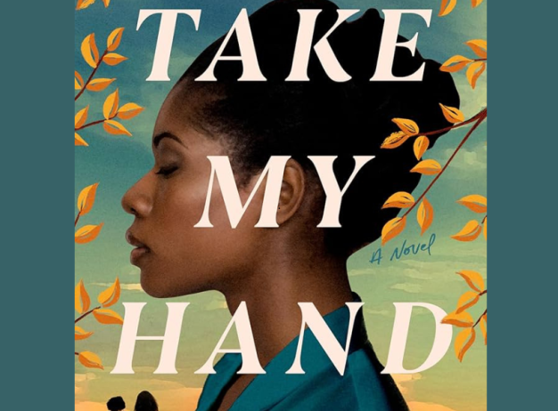 The image features a profile of a woman with closed eyes and an expression of calm, set against a golden landscape with fall leaves. The text "Take My Hand" is overlaid in bold white letters.