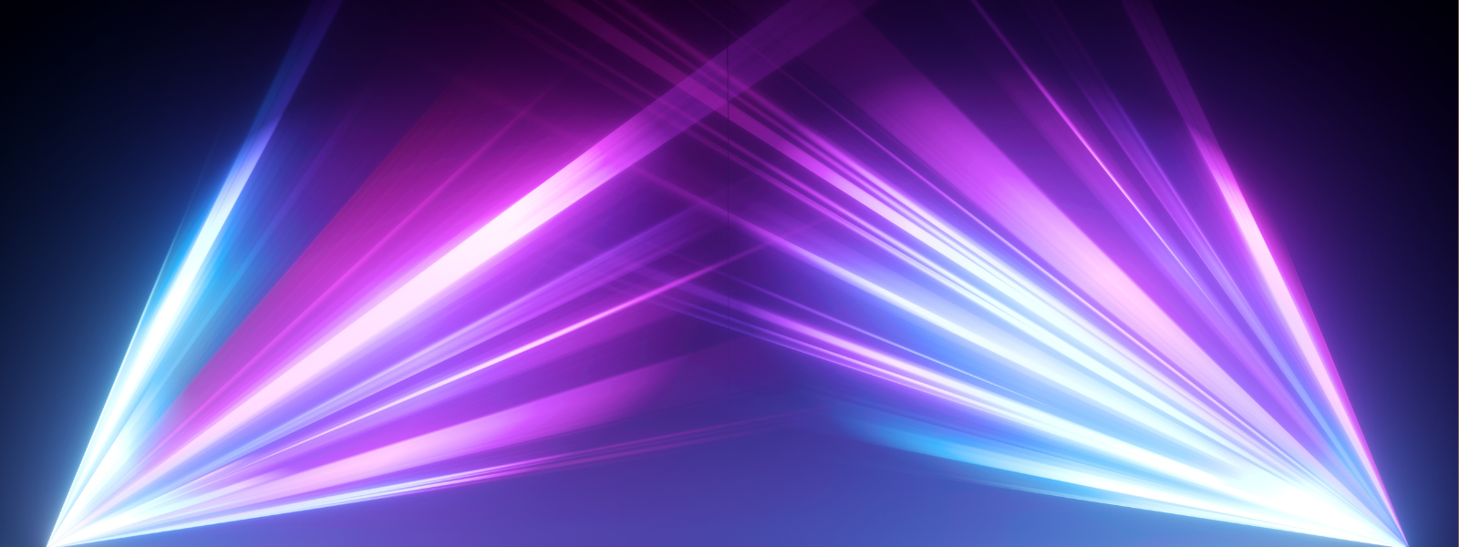 A vibrant display of intersecting pink, purple, and blue lights forms an X shape against a dark background, creating a dynamic and futuristic feel.