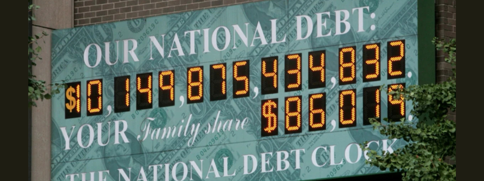 Green digital display of the U.S. National Debt Clock shows $10,149,875,434,832 and family share $86,014, set against a dollar bill backdrop.